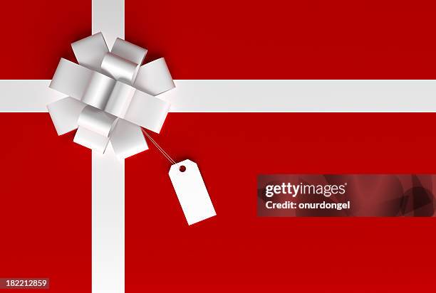 gift box and a tag - wrapping stock pictures, royalty-free photos & images
