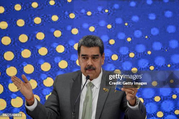 President of Venezuela Nicolas Maduro speaks during a press conference on the day after Venezuelans voted in the referendum about the border conflict...