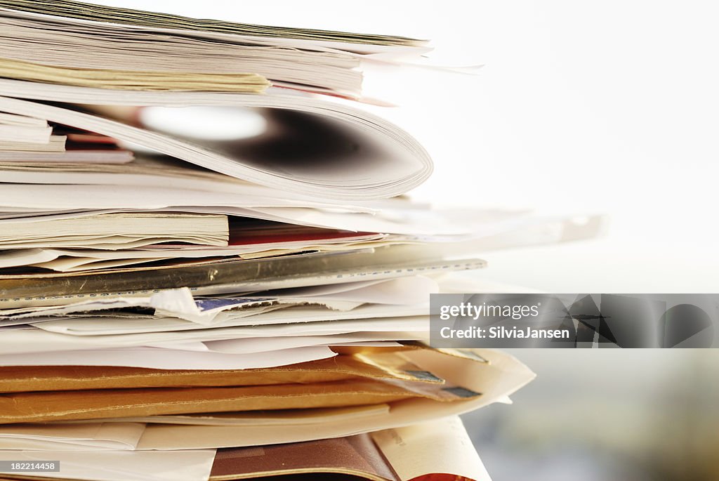 Stack of folders, papers and envelops