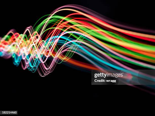 wave of pyrotechnic coloured lights - sinuskurva bildbanksfoton och bilder