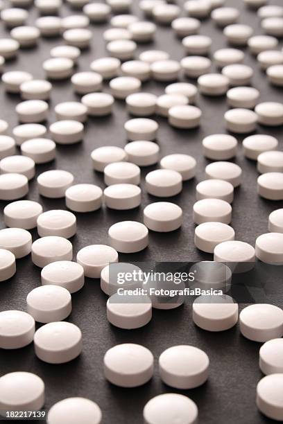 white pills - mdma stock pictures, royalty-free photos & images