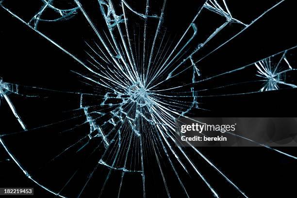 close-up of a piece of broken glass - fracture stock pictures, royalty-free photos & images