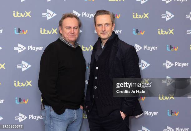 Philip Glenister and Nicholas Gleaves attend the launch photocall for "After The Flood" at Soho Hotel on November 30, 2023 in London, England.