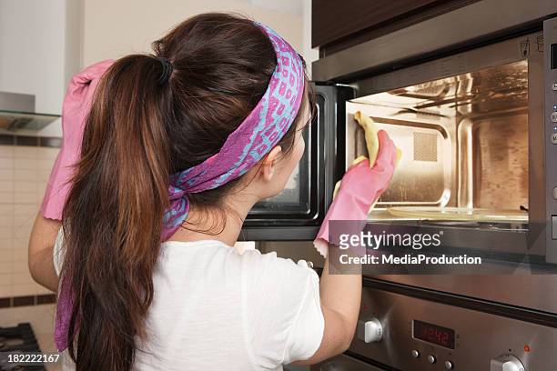 cleaning oven - clean up stock pictures, royalty-free photos & images