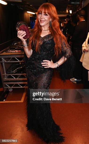 Charlotte Tilbury, winner of the Special Recognition Award, poses backstage at The Fashion Awards 2023 presented by Pandora at The Royal Albert Hall...