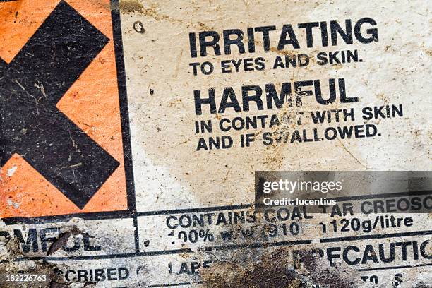 hazard warning label. - chemical hazard symbol stock pictures, royalty-free photos & images