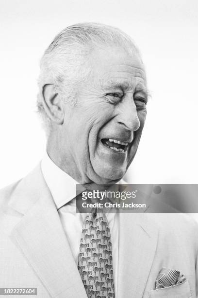 King Charles III laughs during a visit at the Heriot-Watt University to formally open the Dubai campus during COP28 on November 30, 2023 in Dubai,...