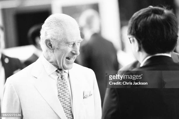 King Charles III meets with students during a visit at the Heriot-Watt University to formally open the Dubai campus during COP28 on November 30, 2023...