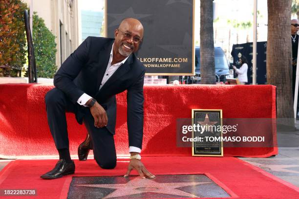 Singer-songwriter Darius Rucker poses for a photo with his newly unveiled Hollywood Walk of Fame star in Hollywood, California, on December 4, 2023.