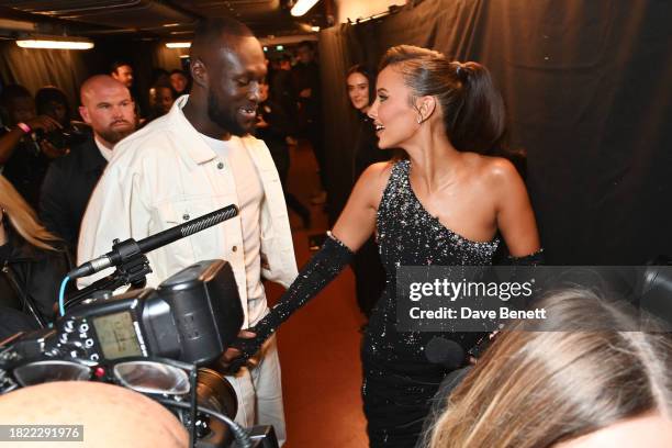 Stormzy and Maya Jama pose backstage at The Fashion Awards 2023 presented by Pandora at The Royal Albert Hall on December 4, 2023 in London, England.