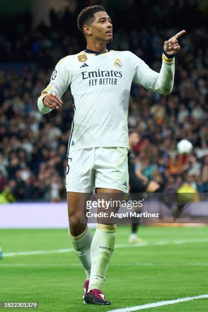 Jude Bellingham of Real Madrid celebrates after scoring the team's second goal during the UEFA Champions League match between Real Madrid and SSC...