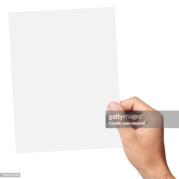 hand holding a blank piece of paper - bord bericht stockfoto's en -beelden