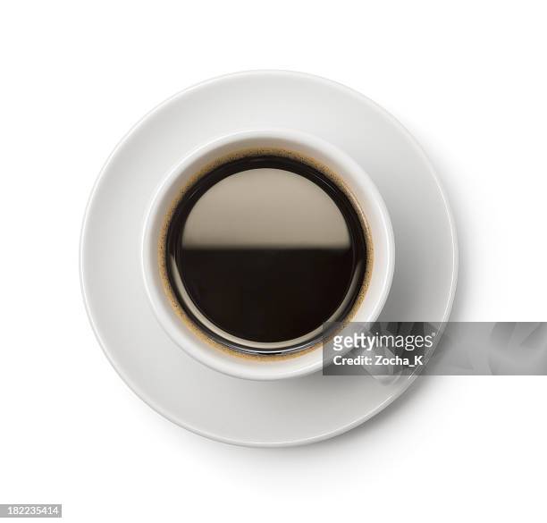 a top-down picture of a cup of coffee on a plate - coffee cup from above stock pictures, royalty-free photos & images