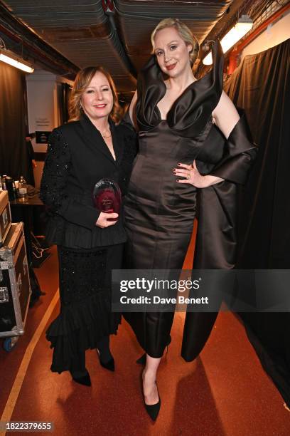 Sarah Mower, winner of the Trailblazer Award, and Gwendoline Christie pose backstage at The Fashion Awards 2023 presented by Pandora at The Royal...