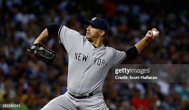 Andy Pettitte of the New York Yankees throws a pitch in the second inning against the Houston Astros at Minute Maid Park on September 28, 2013 in...