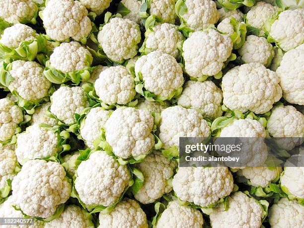 bin of cauliflower heads - califlower stock pictures, royalty-free photos & images