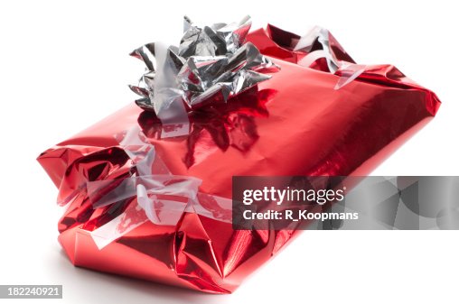 Badly wrapped, messy Christmas present Badly wrapped, messy Christmas present