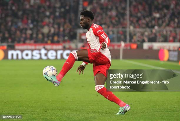 Alphonso Davies of FC Bayern München plays the ball during the UEFA Champions League match between FC Bayern München and F.C. Copenhagen at Allianz...