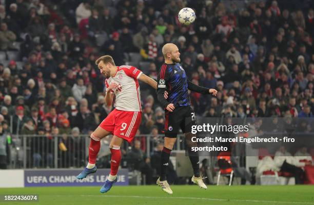 Harry Kane of FC Bayern München and Nicolai Boilesen of F.C. Copenhagen compete for the ball during the UEFA Champions League match between FC Bayern...