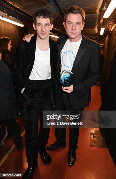 Josh O'Connor and Jonathan 'JW' Anderson, winner of the Designer of the Year Award, pose backstage at The Fashion Awards 2023 presented by Pandora at...