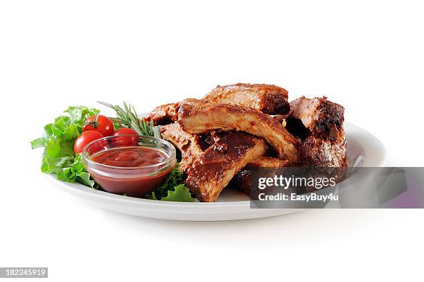 pila de las costillas de cerdo - plate fotografías e imágenes de stock