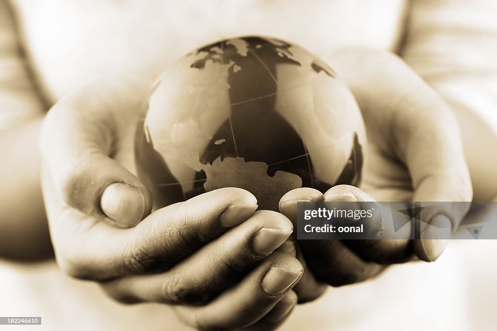 Globe in hands