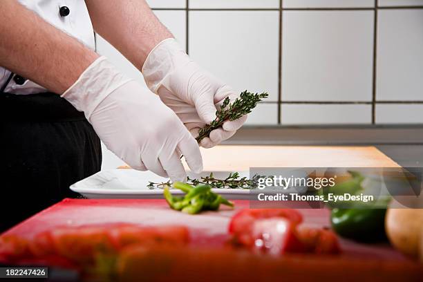 chef and trainee - surgical glove stock pictures, royalty-free photos & images