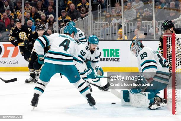 The rebound comes off San Jose Sharks goalie Mackenzie Blackwood during a game between the Boston Bruins and the San Jose Sharks on November 30 at TD...
