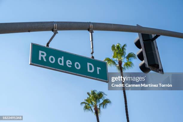 rodeo dr drive street sign in beverly hills los angeles, usa. - beverly hills california stock pictures, royalty-free photos & images