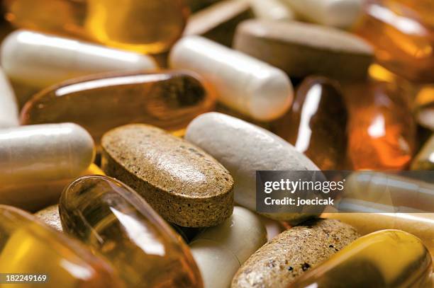 vitamina pastillas - vitamina fotografías e imágenes de stock