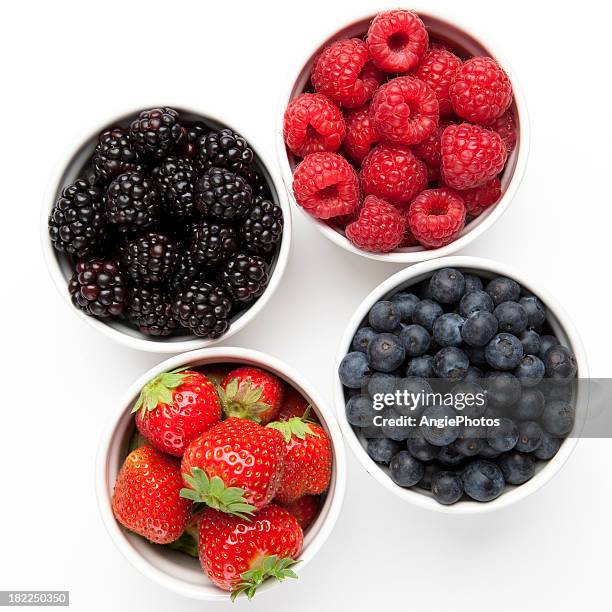 different berries - raspberries bowl stock pictures, royalty-free photos & images