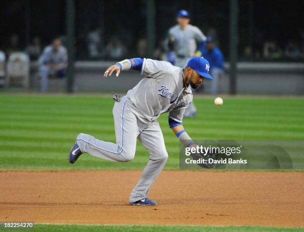 Emilio Bonifacio of the Kansas City Royals makes an error on Leury Garcia of the Chicago White Sox during the first inning on September 28, 2013 at...