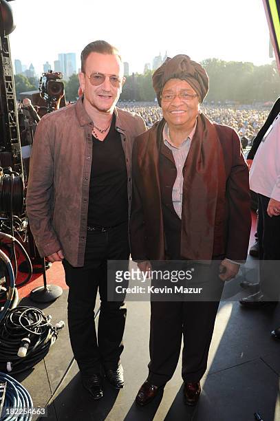 Bono and the president of Liberia Ellen Johnson Sirleaf appear at the 2013 Global Citizen Festival in Central Park to end extreme poverty on...