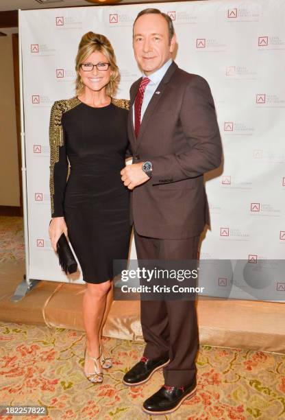 Ashleigh Banfield and Kevin Spacey pose on the red carpet during the Kevin Spacey Foundation Washington Gala Dinner at Mandarin Oriental Hotel on...