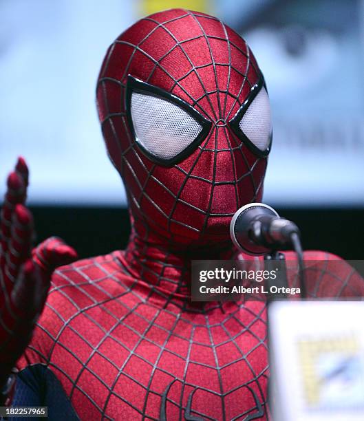 Actor Andrew Garfield dressed as Spider-Man attends The Sony and Screen Gems Panel featuring The Amazing Spider-Man 2 as part of Comic-Con...