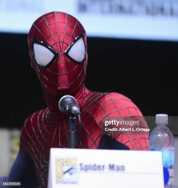 Actor Andrew Garfield dressed as Spider-Man attends The Sony and Screen Gems Panel featuring The Amazing Spider-Man 2 as part of Comic-Con...