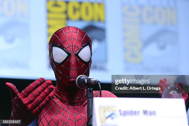 Actor Andrew Garfield dressed as Spider-Man attends The Sony and Screen Gems Panel featuring The Amazing Spider-Man 2 as part of Comic-Con...