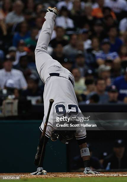 Eduardo Nunez of the New York Yankees dives to avoid a pitch in the sixth inning against the Houston Astros at Minute Maid Park on September 28, 2013...