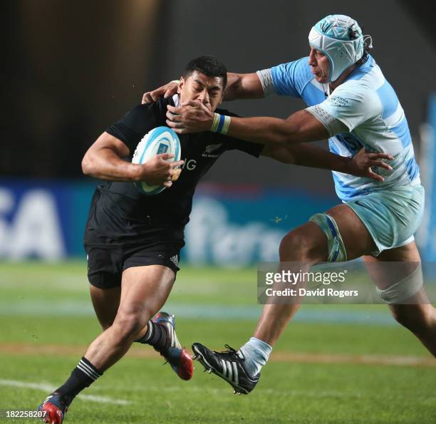 Charles Piutau of the All Blacks is tackled by Patricio Albacete during The Rugby Championship match between Argentina and the New Zealand All Blacks...