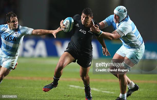 Charles Piutau of the All Blacks is tackled by Patricio Albacete and Nicolas Sanchez during The Rugby Championship match between Argentina and the...