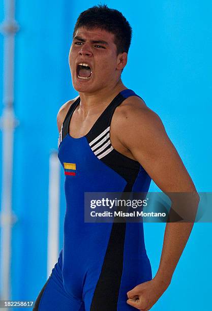 Juand David of Colombia, celebrates after wining the gold medal in Greco Roman 76kg as part of the I ODESUR South American Youth Games at...