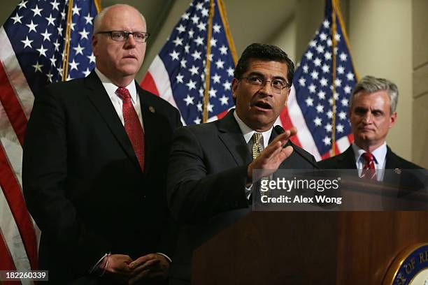 House Democratic Caucus Chairman Rep. Xavier Becerra speaks as Vice Chairman Rep. Joseph Crowley , and Rep. Robert Andrews listen during a news...