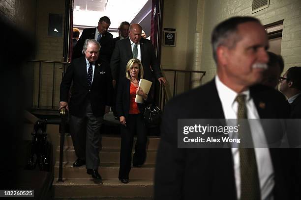 Republican House members, including Rep. Marsha Blackburn , leave the room after a House Republican Conference meeting September 28, 2013 on Capitol...