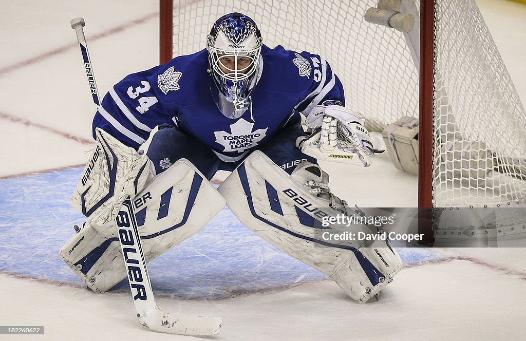Toronto Maple Leafs goalie James Reimer (34) stares down the Detroit Red Wings late in the game as the Toronto Maple Leafs defeated the Detroit Red Wings 3-1