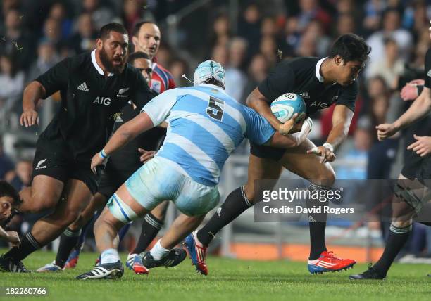 Julian Savea of the All Blacks moves past Patricio Albacete during The Rugby Championship match between Argentina and the New Zealand All Blacks at...