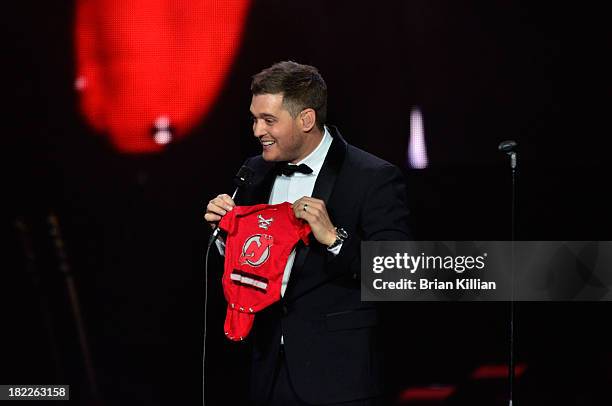 Singer Michael Buble performs at Prudential Center on September 28, 2013 in Newark, New Jersey.