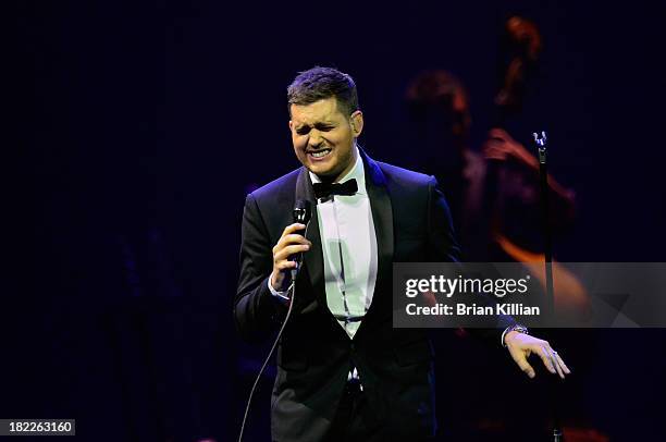 Singer Michael Buble performs at Prudential Center on September 28, 2013 in Newark, New Jersey.