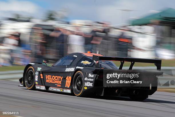 The Corvette DP of Jordan Taylor and Max Angelelli of Italy races up a hill during the Grand-Am Rolex Series race at Lime Rock Park on September 28,...