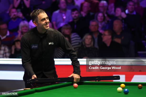 Ronnie O'Sullivan of England reacts following victory against Robert Milkins of England in their Round 2 match on Day Six of the MrQ UK Snooker...