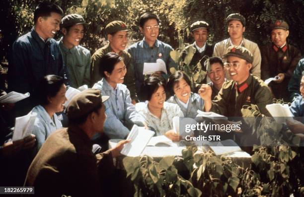 Chinese youth study with red guards the copies of Mao Zedong "Little Red Book" somewhere in China in a picture released in 1971 by official Chinese...